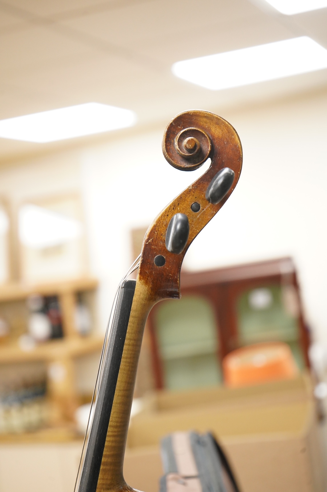 A cased late 19th century German viola, the body 15 3/4”, bearing a label reading Max Lutz 1939
